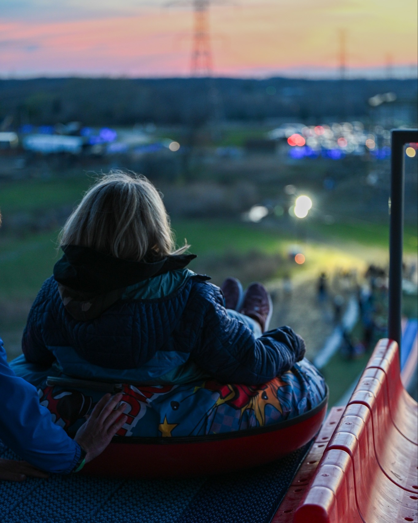 Guest preparing to slide down Randy's Thrill Hill at Bear Paw Adventure Park.