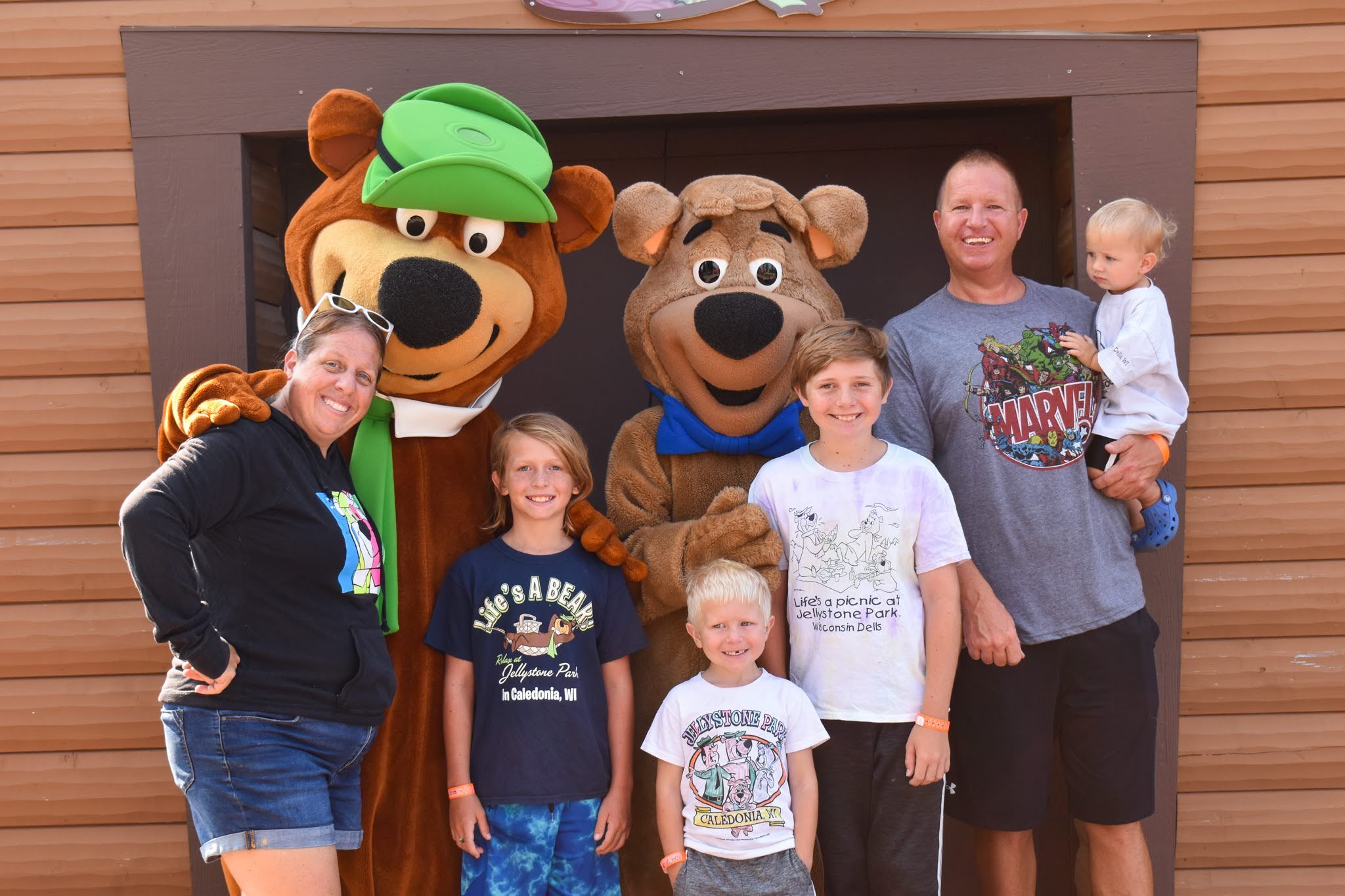 An image of a family at Jellystone Park having fun at the Rec Center.