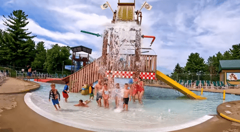 An image of campers playing in the splash zone at Jellystone Park™ Caledonia. An image of campers playing in the splash zone at Jellystone Park™ Caledonia.