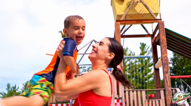 An image from Jellystone Park showing a family having fun at our waterpark.