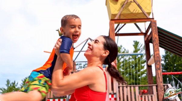 An image of a mother and child playing in the splash zone at Jellystone Park™ Caledonia. An image of a mother and child playing in the splash zone at Jellystone Park™ Caledonia.