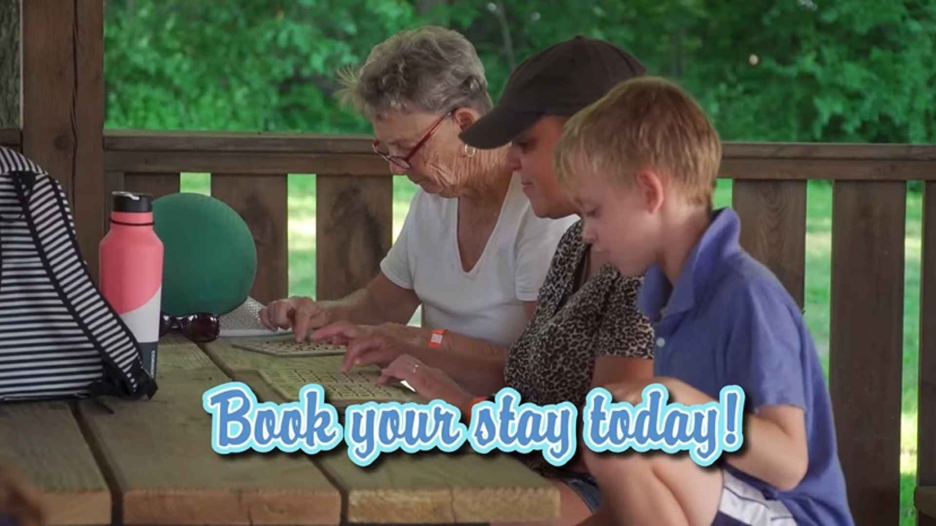 An image of a multigenerational family having fun playing at their cabin. An image of a multigenerational family having fun playing at their cabin.