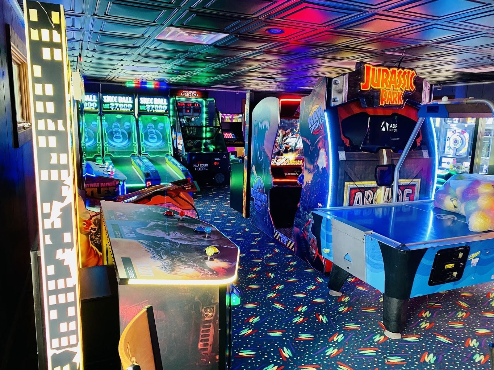 An image of kids playing games in the arcade game room at Jellystone Park™ Caledonia. An image of kids playing games in the arcade game room at Jellystone Park™ Caledonia.